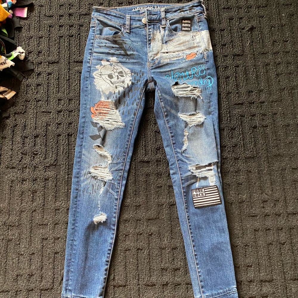 American Eagle Patches Paint Dope Jeans